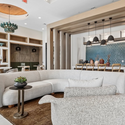 a spacious room with natural lighting and a media area at Preserve at West Carroll in Kissimmee, FLorida