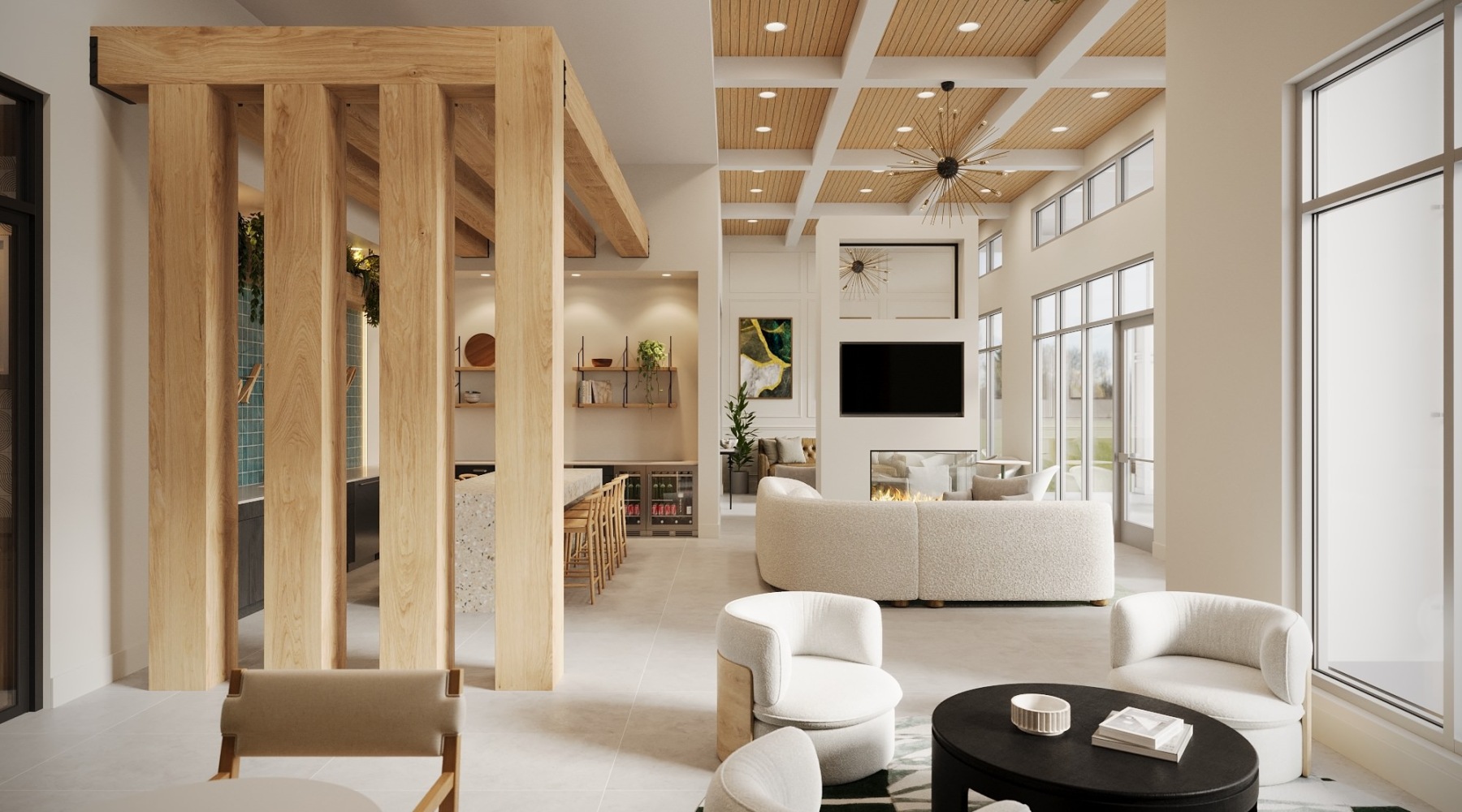 a spacious clubroom with lounge seating and a media area