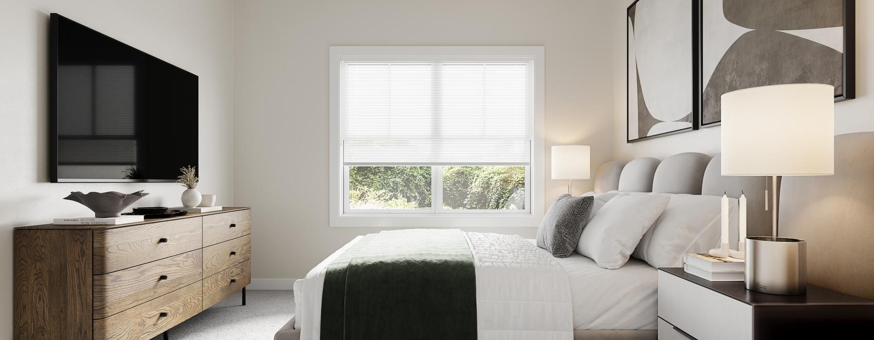 a naturally lit bedroom with a tv, dresser, and bedside tables